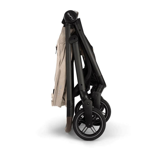 Nuna SWIV Stroller with Magnetic Buckle - Biscotti