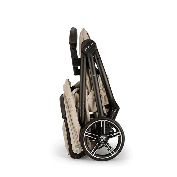 Nuna TRVL lx Compact Stroller with Travel Bag - Mica ( Delicate Neutral Beige BMW Logo)